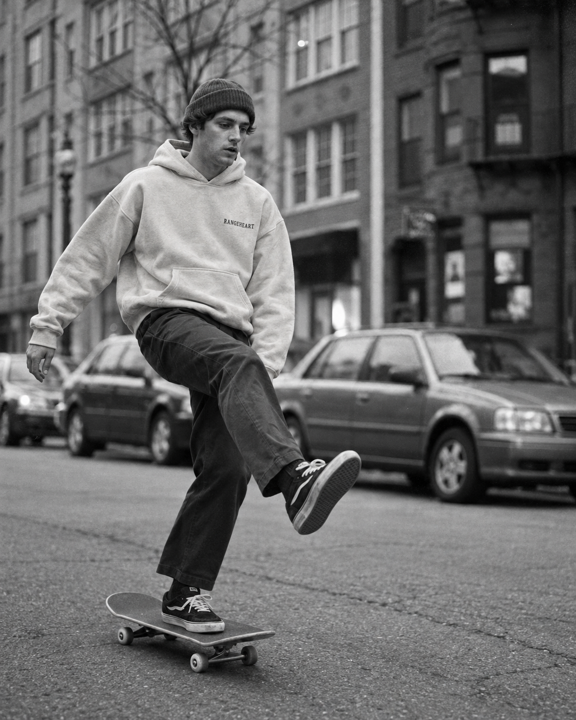 Bone All for Fun hoodie worn by a skater in a grainy black-and-white street scene