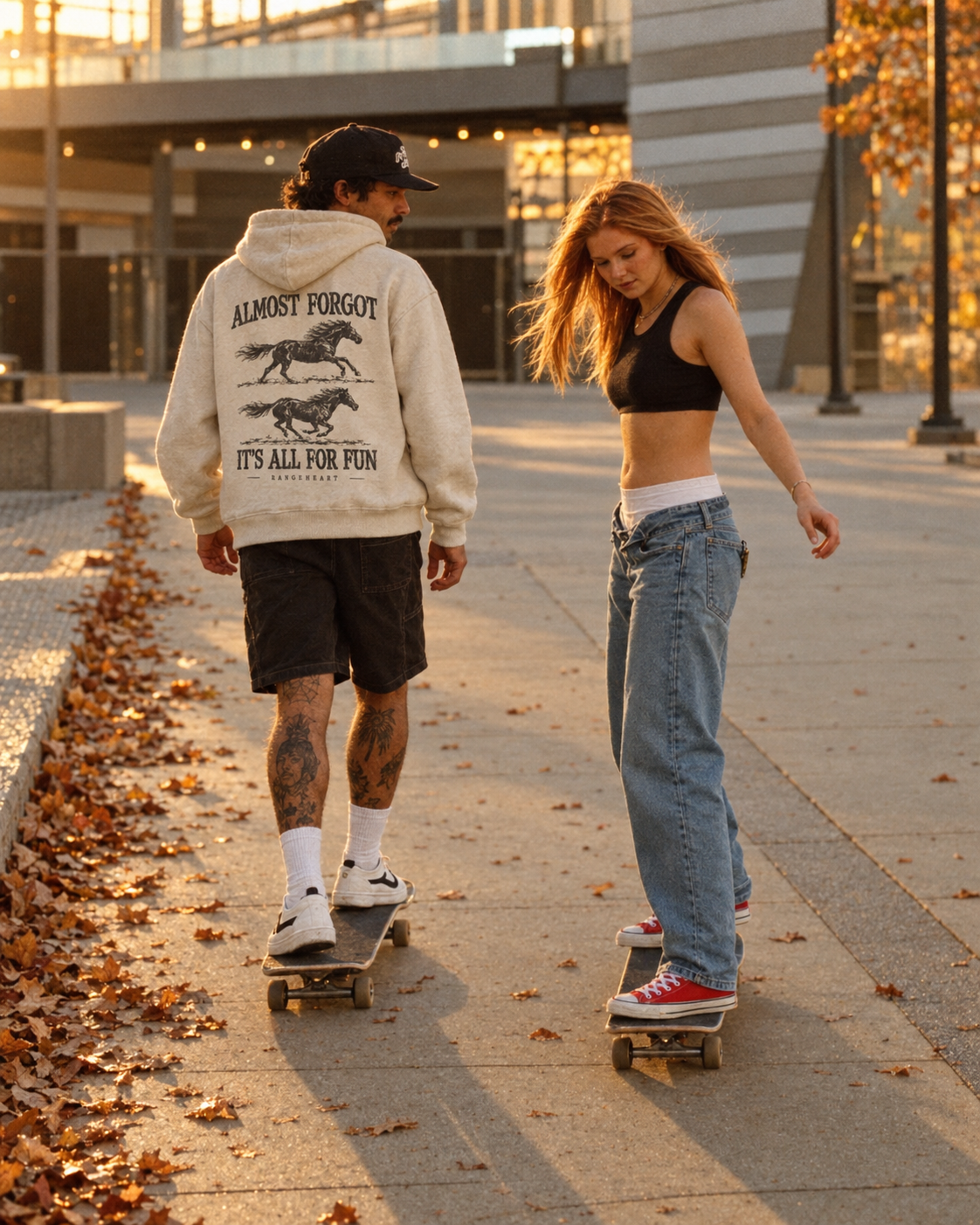 All for Fun hoodie horse artwork worn while skating on an autumn city sidewalk