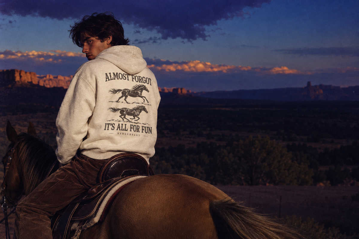 Bone All for Fun hoodie back graphic on a horseback rider at dusk