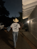 All for Fun tee back graphic in an outdoor couple scene