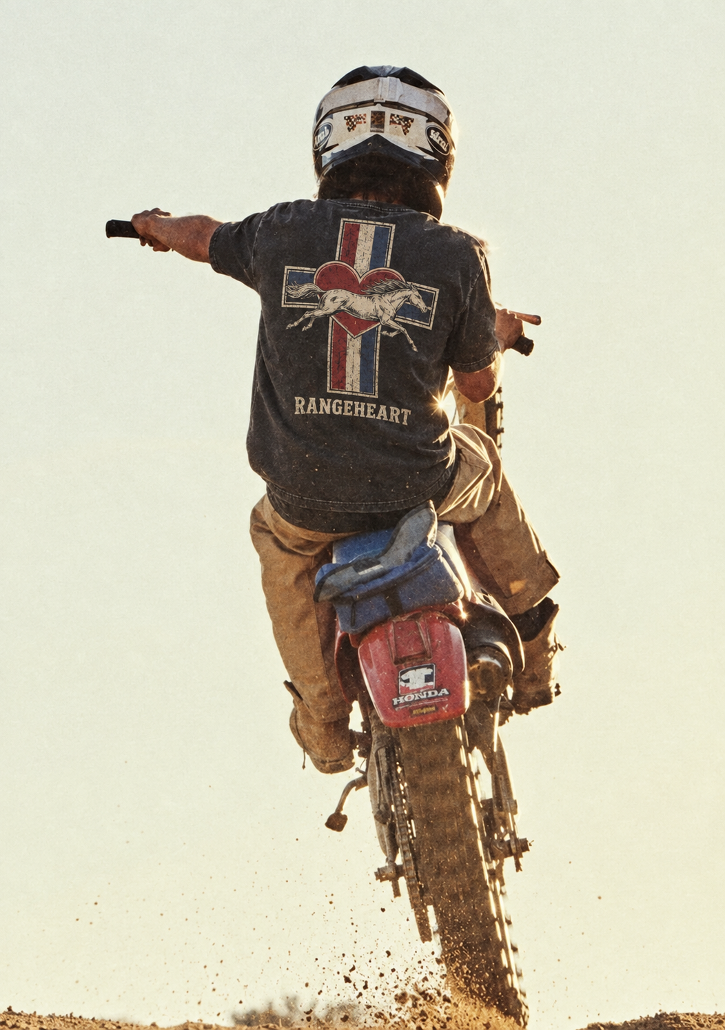 Cross Heart tee back graphic worn on a dirt bike