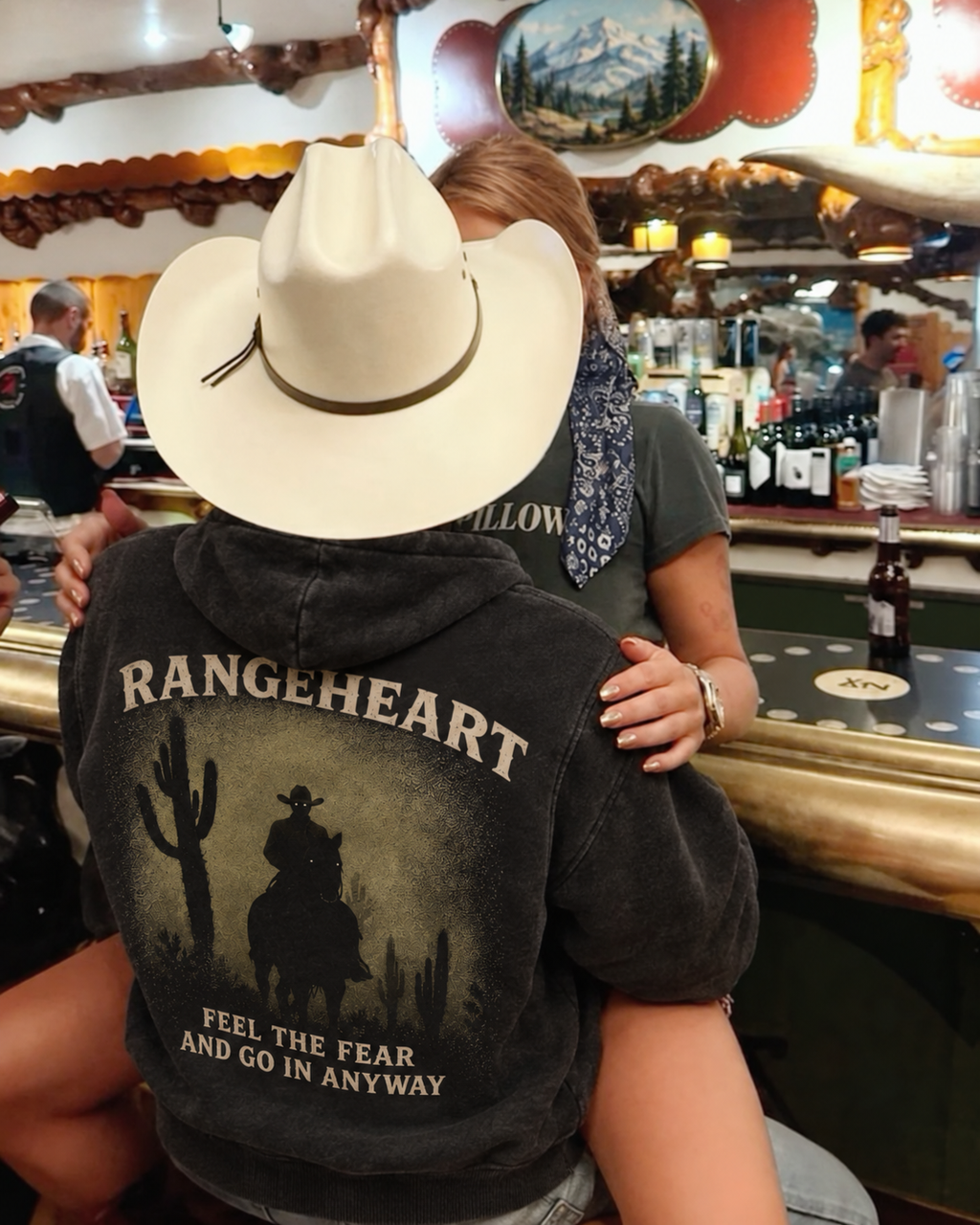 Feel the Fear hoodie back artwork in a Western bar