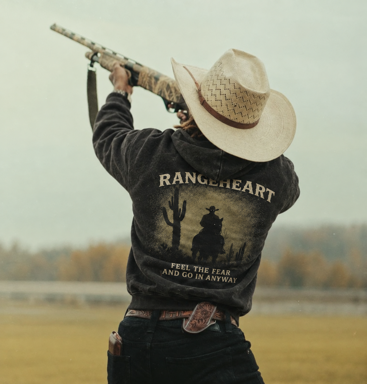 Feel the Fear hoodie worn outdoors, showing the rider and cactus back graphic