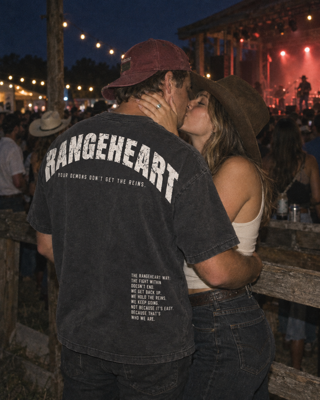 Hold the Reins tee back graphic at an outdoor concert