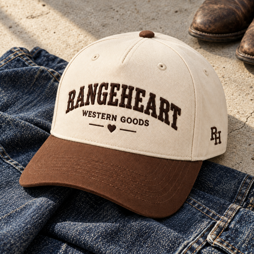 Western Goods Cap in Cream / tobacco — styled with denim