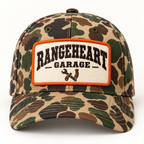 Garage Cap in Woodland camo / orange — front view
