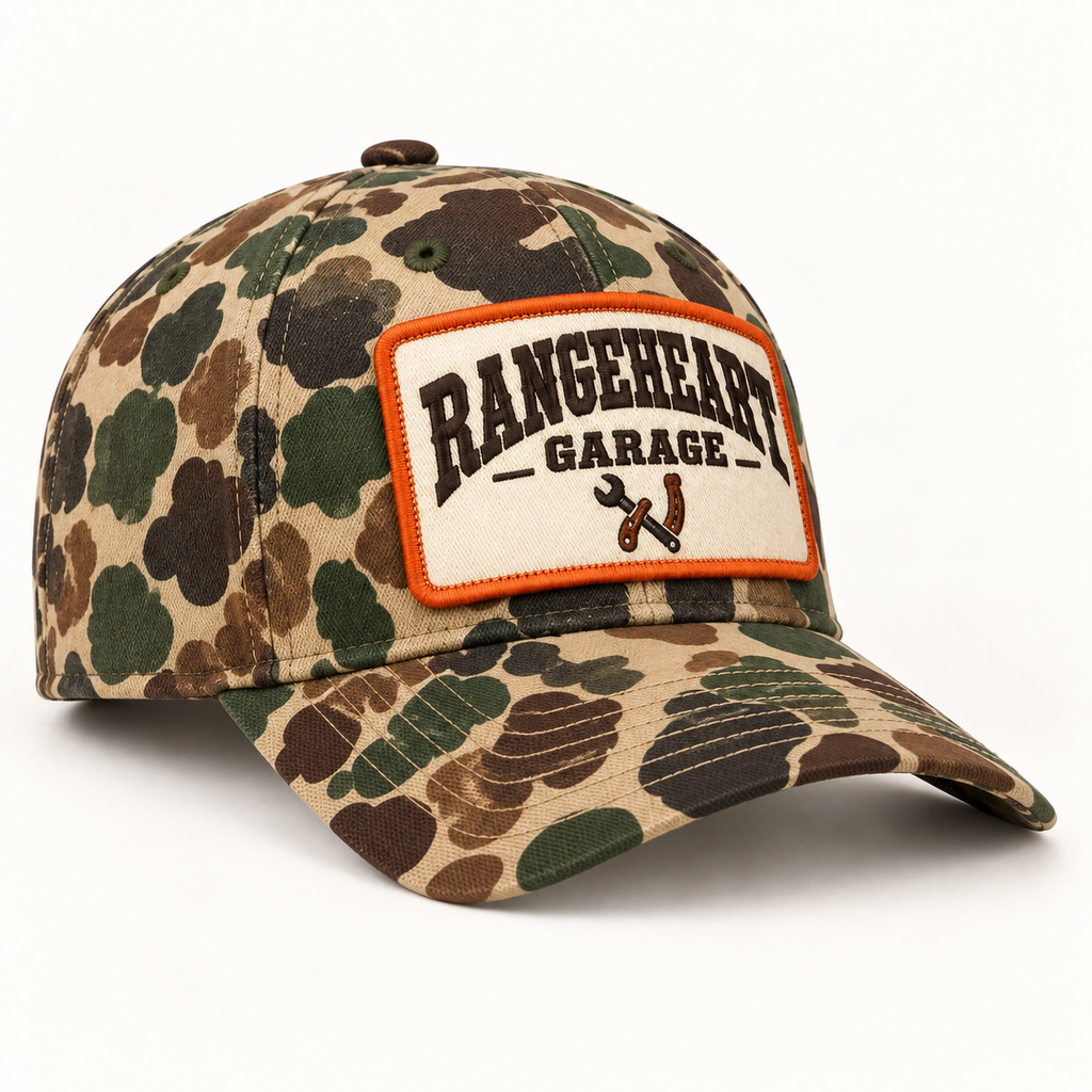 Garage Cap in Woodland camo / orange — side angle
