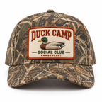 Duck Camp Social Club baseball cap in Woodland camo / orange — front view
